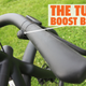 A photo of the VanMoof handlebars highlighting the Turbo Boost button on the right hand side.